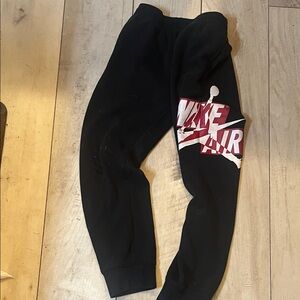 Nike Kids Black Sweatpants with Red and White 'Nike Air' Graphic